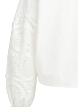 Blouse with embroideried sleeves